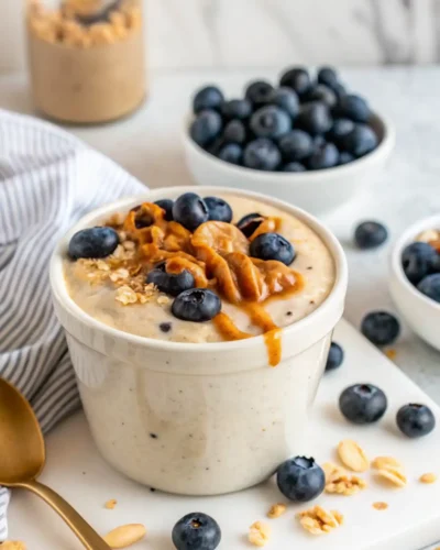 Blended overnight oats with peanut butter drizzle