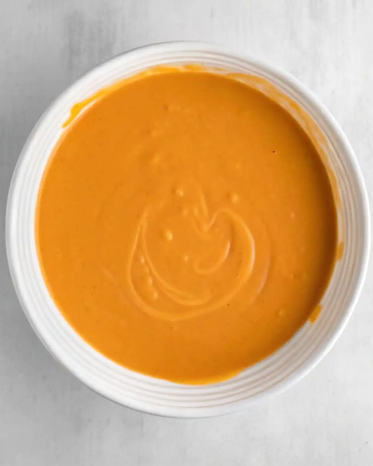 Whisked wet ingredients for gluten free pumpkin bread