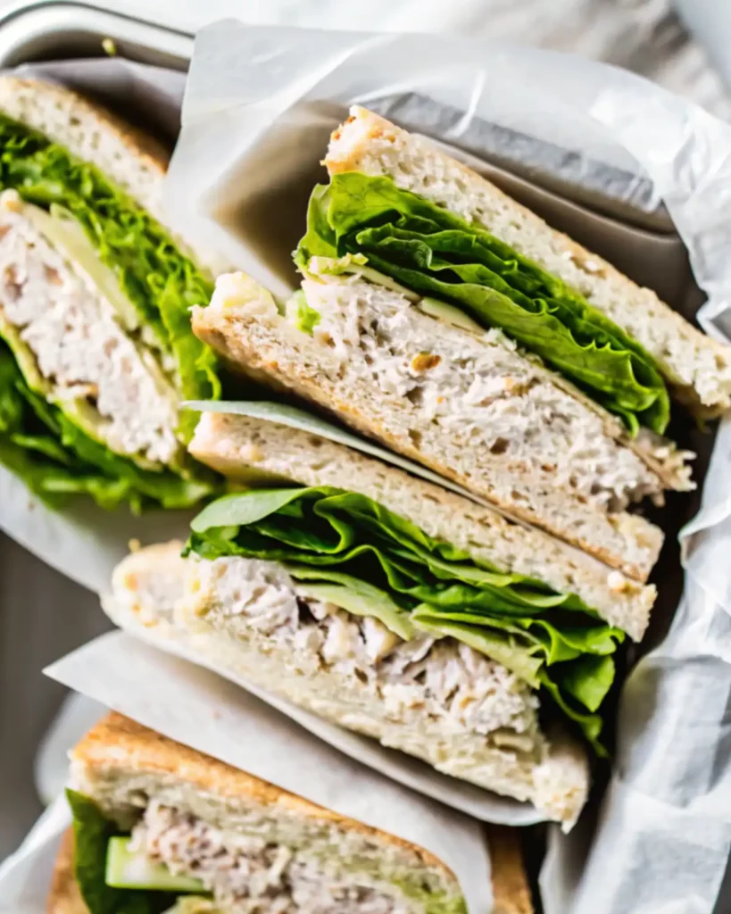 Tuna sandwich slices in container