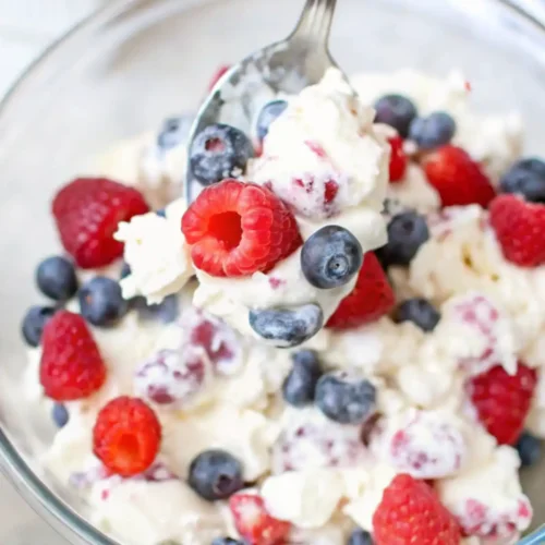 red white and blue cheesecake salad serving spoon
