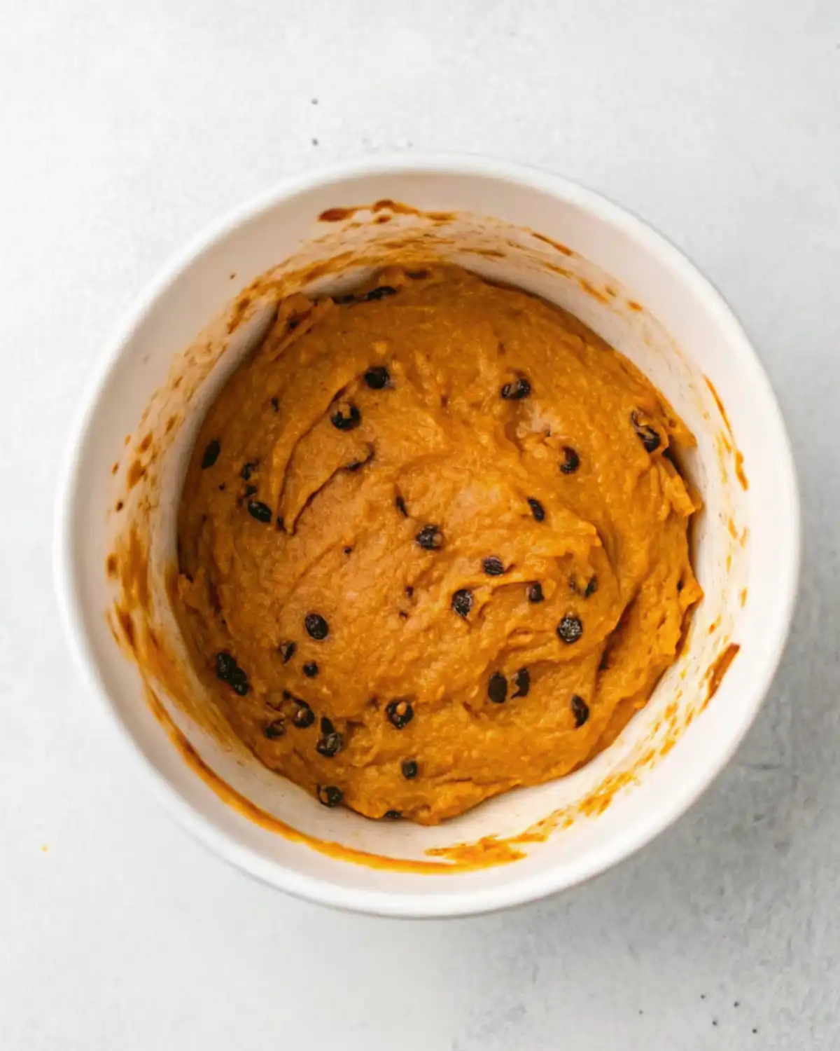 Pumpkin Chocolate Chip Muffins Pumpkin muffin batter with chocolate chips